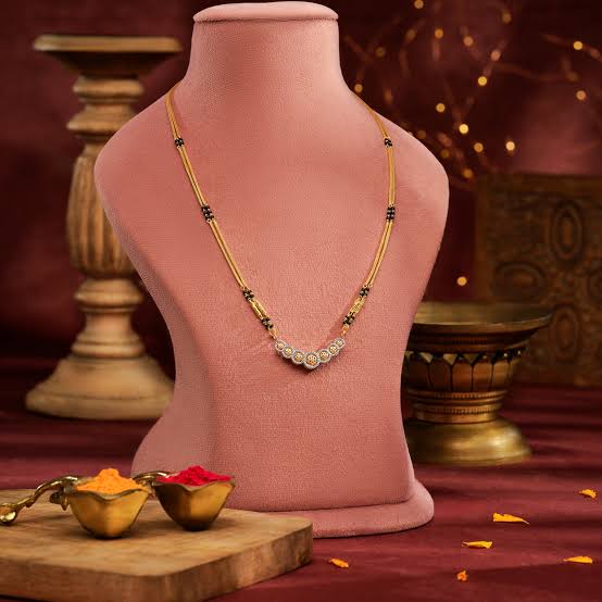 Diamond mangalsutra on a display bust